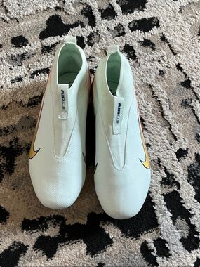 Nike Kids White Slip-On Sneakers with Yellow Swoosh